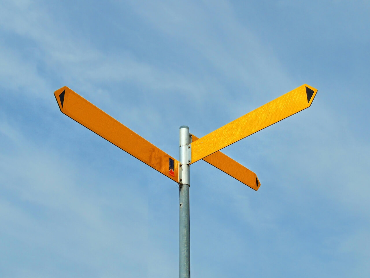 Signs pointing in different directions.