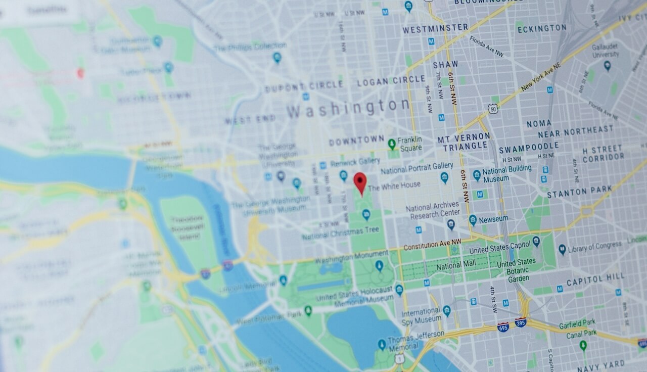 A screenshot from Google maps with a red navigation marker on a specific location.