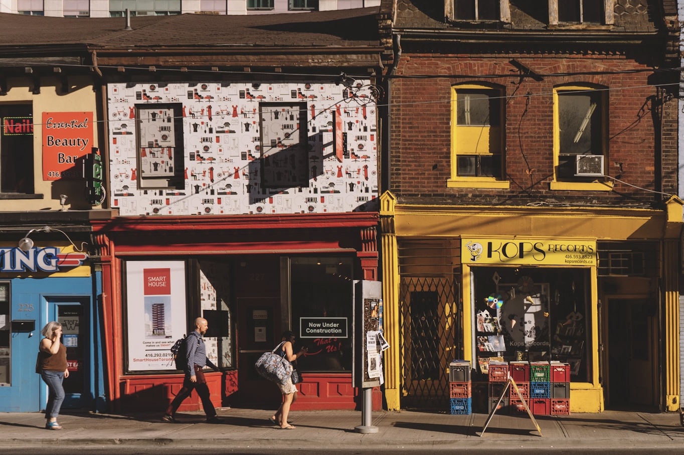 Photograph of a city street with storefronts