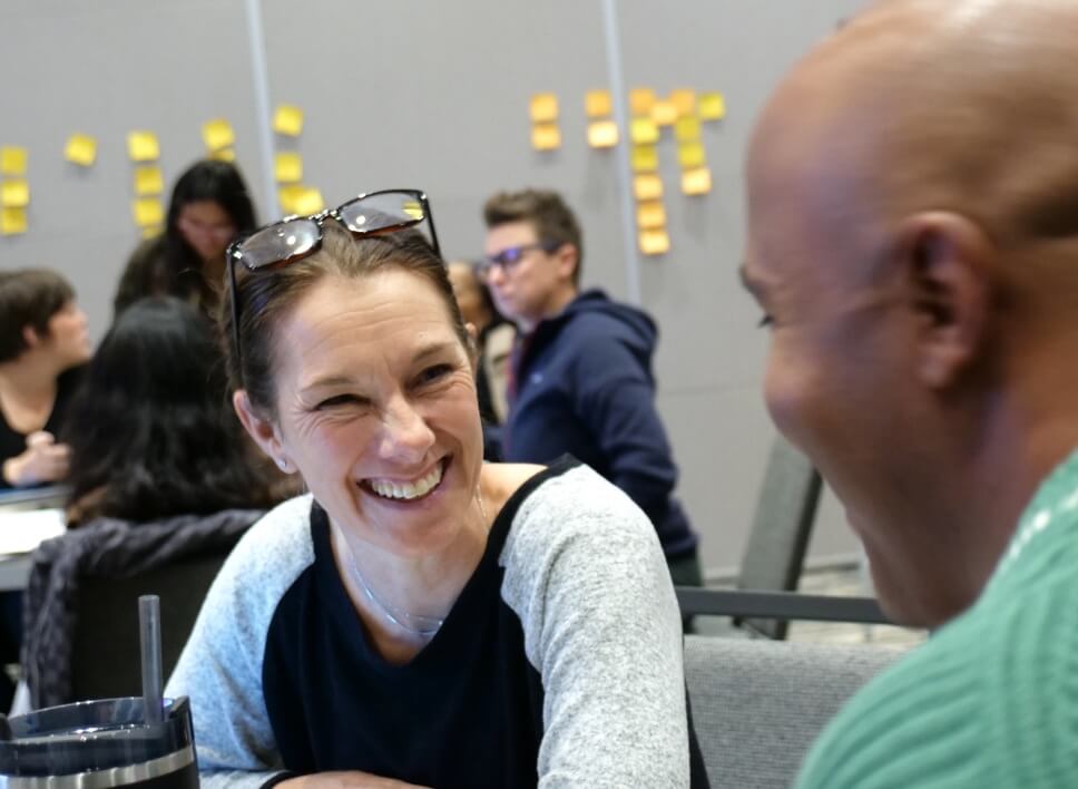 Instructor leading a workshop for her colleagues